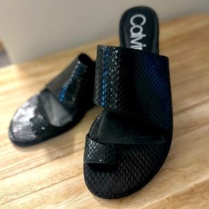 Calvin Klein fox textured leather sandals.